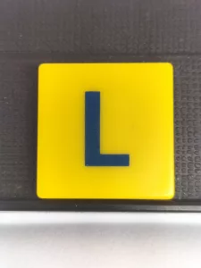 Article L - SCRABBLE JUNIOR
